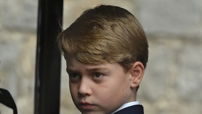 Prince George: Prince George of Wales is seen arriving at St George's Chapel. (Reuters)