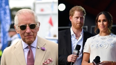 King Charles has approved the Royal family’s strategy of navigating Meghan Markle and Prince Harry's attacks on the monarchy, an insider has claimed (Photo by Daniel LEAL / POOL / AFP, Angela Weiss / AFP) King Charles has approved the Royal family’s strategy of navigating Meghan Markle and Prince Harry's attacks on the monarchy, an insider has claimed (Photo by Daniel LEAL / POOL / AFP, Angela Weiss / AFP)