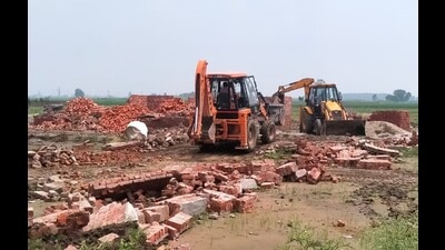 Illegal structures being demolished in Ludhiana on Monday. (HT PHOTO)