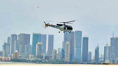 Mumbai, India - July 31, 2023: Coast guard helicopter conducting search operation, after a man jumped from bandra worli sealink in Mumbai, India, on Monday, July 31, 2023. (Photo by HT Photo/ Hindustan Times) (Hindustan Times) Mumbai, India - July 31, 2023: Coast guard helicopter conducting search operation, after a man jumped from bandra worli sealink in Mumbai, India, on Monday, July 31, 2023. (Photo by HT Photo/ Hindustan Times) (Hindustan Times)
