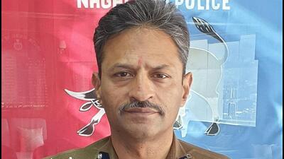 Nagaland DGP Rupin Sharma (in photo) said the state police has sought action against police officer Michael Yanthan (Twitter/rupin1992) Nagaland DGP Rupin Sharma (in photo) said the state police has sought action against police officer Michael Yanthan (Twitter/rupin1992)