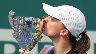 Poland's Iga Swiatek celebrates her victory after winning the final match at the WTA250 Poland Open tennis tournament In Warsaw, Poland (AP)