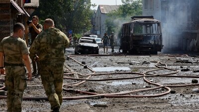 Emergencies services members work at the site of a shelling in the course of Russia-Ukraine conflict in Donetsk, (REUTERS)