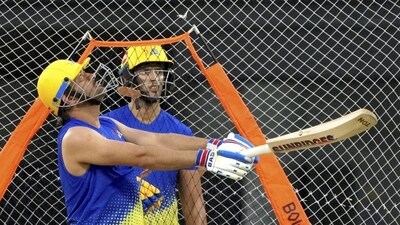 Shivam Dube (behind) with MS Dhoni Shivam Dube (behind) with MS Dhoni