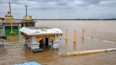 An area is seen submerged in the floodwaters of the swollen Godavari River in the temple town of Bhadrachalam, Saturday. (PTI) An area is seen submerged in the floodwaters of the swollen Godavari River in the temple town of Bhadrachalam, Saturday. (PTI)