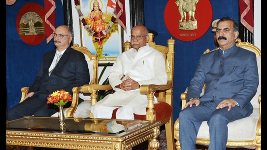 Himachal Pradesh Chief Justice Mamidanna Satya Ratna Ramachandra Rao, governor Shiv Pratap Shukla and chief minister Sukhvinder Singh Sukhu during the oath taking ceremony of three judges of Himachal Pradesh high court at Raj Bhawan in Shimla on Monday. (HT photo)