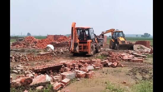 Illegal structures being demolished in Ludhiana on Monday. (HT PHOTO)