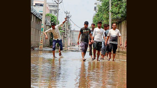 Residents of Bahadurke village are grappling with clogged sewerage and damaged roads in Ludhiana. (HT PHOTO)