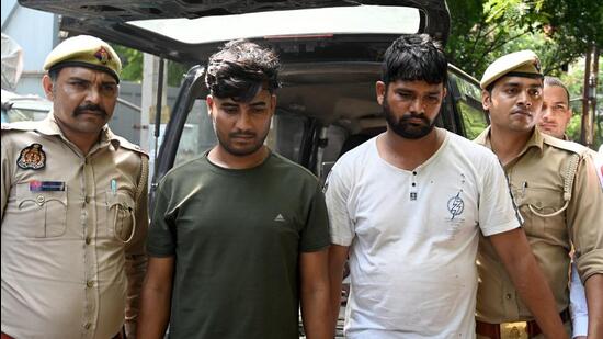 The suspects have been identified as Sirajuddin, 36, a resident of Mayur Vihar Phase 3, Delhi, and Shahzad, 32, a resident of Khanauri town in Sangrur, Punjab. They wore formal suits to appear like businessmen while committing robberies and thefts to evade suspicion. (Sunil Ghosh/HT Photo)