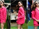 Alia Bhatt wears a hot pink linen shirt and shorts set for an outing in Mumbai. Alia Bhatt wears a hot pink linen shirt and shorts set for an outing in Mumbai.