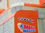 FILE - The awnings of a store advertise the sale of lottery tickets, including Mega Millions, Wednesday, Jan. 11, 2023, in New York. The Mega Millions prize has grown to an estimated $1.05 billion for the Tuesday, Aug. 1, 2023, drawing. FILE - The awnings of a store advertise the sale of lottery tickets, including Mega Millions, Wednesday, Jan. 11, 2023, in New York. The Mega Millions prize has grown to an estimated $1.05 billion for the Tuesday, Aug. 1, 2023, drawing.