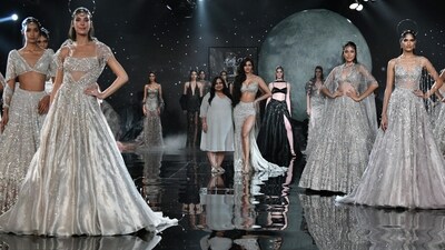Dolly J's ‘Selene’ collection is inspired by the enigmatic Moon - a timeless symbol of mystery and beauty. Soft, flowing silhouettes accentuate the wearer, while pearly white sequins, metallic tissues, ivory tulle, and iridescent silver sequins mirror its ethereal glow. Burnt copper, washed gunmetal, and deep red hues embody the celestial mystique. (ANI Photo/Rahul Singh) Dolly J's ‘Selene’ collection is inspired by the enigmatic Moon - a timeless symbol of mystery and beauty. Soft, flowing silhouettes accentuate the wearer, while pearly white sequins, metallic tissues, ivory tulle, and iridescent silver sequins mirror its ethereal glow. Burnt copper, washed gunmetal, and deep red hues embody the celestial mystique. (ANI Photo/Rahul Singh)