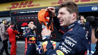 Winner Red Bull Racing's Dutch driver Max Verstappen (R) reacts flanked by second-placed Red Bull Racing's Mexican driver Sergio Perez (AFP) Winner Red Bull Racing's Dutch driver Max Verstappen (R) reacts flanked by second-placed Red Bull Racing's Mexican driver Sergio Perez (AFP)