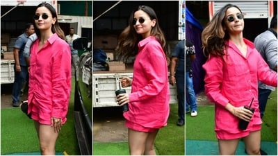 Alia Bhatt wears a hot pink linen shirt and shorts set for an outing in Mumbai. (HT Photo/Varinder Chawla) Alia Bhatt wears a hot pink linen shirt and shorts set for an outing in Mumbai. (HT Photo/Varinder Chawla)