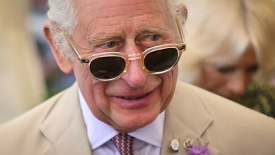 Britain's King Charles III reacts during a visit of the Sandringham Flower Show, in Sandrigham, north west England, on July 26, 2023. (AFP)