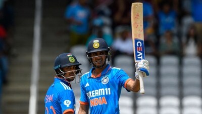 Ishan Kishan (L) looks to the dressing room as Shubman Gill (R), of India, celebrates his half-century (AFP) Ishan Kishan (L) looks to the dressing room as Shubman Gill (R), of India, celebrates his half-century (AFP)