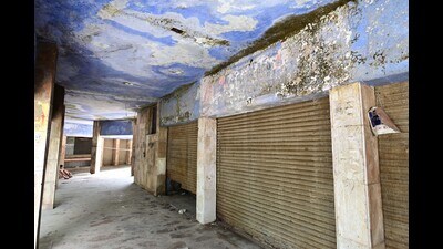 Chandigarh’s Sector 61 Social Welfare and Cultural Association chairman VK Bector said the area has turned into a dumping ground for garbage, with people disposing of their waste in the vacant shops. (Ravi Kumar/HT)