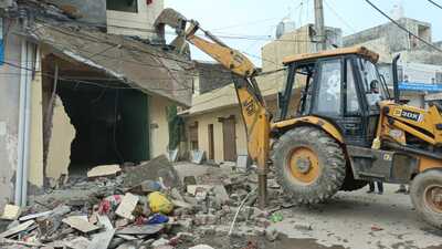 Demolition drive underway at Pabhat village that falls under the Zirakpur MC. (HT Photo) Demolition drive underway at Pabhat village that falls under the Zirakpur MC. (HT Photo)