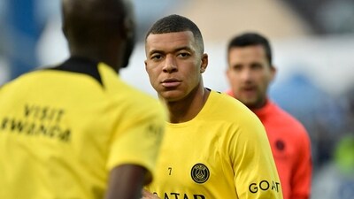 Mbappe shared four images, one of which was a picture of three playing cards, all of them being 9s (AFP) Mbappe shared four images, one of which was a picture of three playing cards, all of them being 9s (AFP)