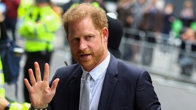 Prince Harry walks outside the Rolls Building of the High Court in London. (Reuters)