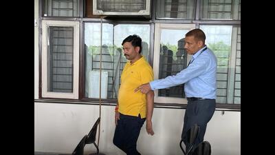 Manish Dubey before being presented before a court in Chandigarh on Tuesday. (HT Photo) Manish Dubey before being presented before a court in Chandigarh on Tuesday. (HT Photo)