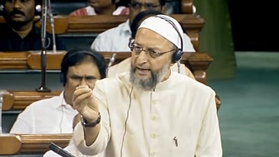 AIMIM MP Asaduddin Owaisi speaks in the Lok Sabha during the ongoing Monsoon Session of Parliament, in New Delhi on Tuesday. (ANI) AIMIM MP Asaduddin Owaisi speaks in the Lok Sabha during the ongoing Monsoon Session of Parliament, in New Delhi on Tuesday. (ANI)