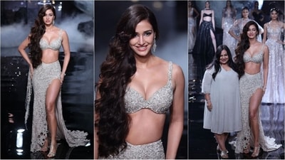 Disha Patani walked the ramp for designer Dolly J in a stunning silver bralette and slit skirt at India Couture Week. (Instagram/@fdciofficial) Disha Patani walked the ramp for designer Dolly J in a stunning silver bralette and slit skirt at India Couture Week. (Instagram/@fdciofficial)