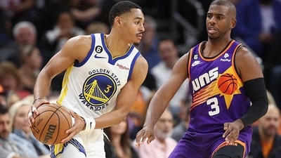 Jordan Poole (Left) of the Golden State Warriors handles the ball against Chris Paul. (Getty) Jordan Poole (Left) of the Golden State Warriors handles the ball against Chris Paul. (Getty)