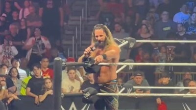At the WWE live event held in Miami, Rollins was seen confronting a fan for calling him a “fake champion.” At the WWE live event held in Miami, Rollins was seen confronting a fan for calling him a “fake champion.”