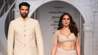 On Day 7 at India Couture Week 2023 in Delhi, actors Aditya Roy Kapur and Sara Ali Khan turned showstoppers for designer duo Shantanu and Nikhil. While Sara was in a heavily-embellished cream lehenga set, Adiya was dressed in a matching kurta and white pyjama. Photos of the two actors have been grabbing attention online with many praising their chemistry. On Day 7 at India Couture Week 2023 in Delhi, actors Aditya Roy Kapur and Sara Ali Khan turned showstoppers for designer duo Shantanu and Nikhil. While Sara was in a heavily-embellished cream lehenga set, Adiya was dressed in a matching kurta and white pyjama. Photos of the two actors have been grabbing attention online with many praising their chemistry.