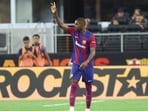 Ousmane Dembele (7) reacts after scoring a goal 