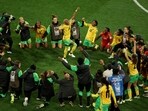Jamaica's Deneisha Blackwood celebrates with teammates after the match as Jamaica qualify for the knockout stages of the World Cup 
