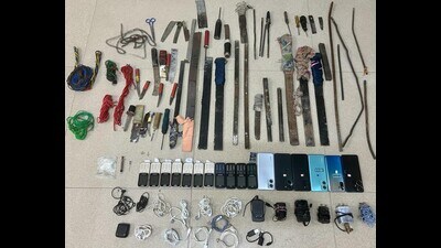 As many as 17 mobile phones and 50 sharp-edged weapons were seized from the Goindwal Central Jail during a joint search operation of Tarn Taran police and the jails department on Wednesday (HT Photo) As many as 17 mobile phones and 50 sharp-edged weapons were seized from the Goindwal Central Jail during a joint search operation of Tarn Taran police and the jails department on Wednesday (HT Photo)