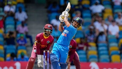 India's Ishan Kishan hits six from a delivery of West Indies' Yannic Cariah (AP) India's Ishan Kishan hits six from a delivery of West Indies' Yannic Cariah (AP)