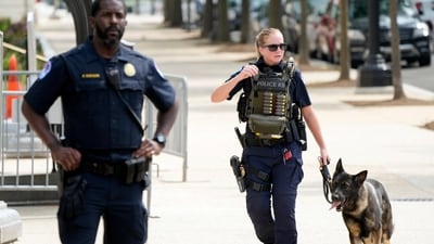 U.S. Capitol Police Officers patrol near the Russell Senate Office Building Wednesday in Washington. (AP) U.S. Capitol Police Officers patrol near the Russell Senate Office Building Wednesday in Washington. (AP)