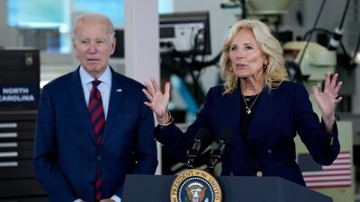 US president Joe Biden listens as first lady Jill Biden speaks. (AP) US president Joe Biden listens as first lady Jill Biden speaks. (AP)