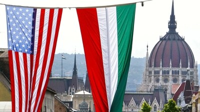 American and Hungarian national flags fly in downtown Budapest, Hungary, with the historical parliament building at the background. The United States is imposing travel restrictions on citizens of Hungary over concerns that the identities of nearly 1 million foreigners granted Hungarian passports over nine years were not sufficiently verified. That's according to the US Embassy and a government official. (AP Photo/Alexander Zemlianichenko, File) American and Hungarian national flags fly in downtown Budapest, Hungary, with the historical parliament building at the background. The United States is imposing travel restrictions on citizens of Hungary over concerns that the identities of nearly 1 million foreigners granted Hungarian passports over nine years were not sufficiently verified. That's according to the US Embassy and a government official. (AP Photo/Alexander Zemlianichenko, File)
