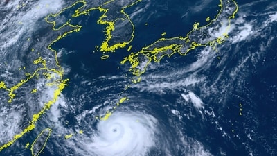This satellite image shows Typhoon Khanun moving north towards Okinawa, southwestern Japan. (AP) This satellite image shows Typhoon Khanun moving north towards Okinawa, southwestern Japan. (AP)