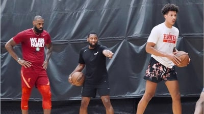 Jalen Johnson with LeBron James Jalen Johnson with LeBron James