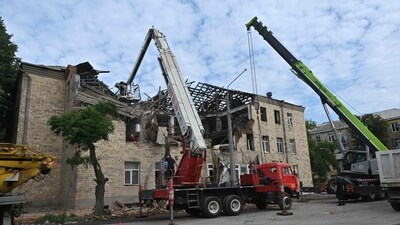 Rescuers clear debris after a drone hit an educational establishment, in Kharkiv, on August 1, 2023, amid the Russian invasion of Ukraine. (AFP) Rescuers clear debris after a drone hit an educational establishment, in Kharkiv, on August 1, 2023, amid the Russian invasion of Ukraine. (AFP)