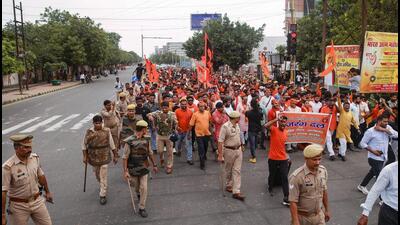 VHP and Bajrang Dal protest march in Noida on Wednesday. (PTI) VHP and Bajrang Dal protest march in Noida on Wednesday. (PTI)