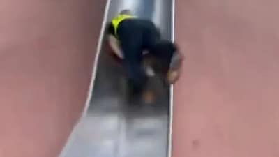 Boston cop’s hilarious slide mishap goes viral (Twitter) Boston cop’s hilarious slide mishap goes viral (Twitter)
