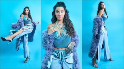 Nora Fatehi is an absolute style diva. The multi-talented actress is not only known for her amazing dance moves but also for her trend-setting looks. With a penchant for daring and eye-catching looks, she constantly pushes the boundaries of style. Nora is currently busy in her dance reality show 'Hip Hop India' and her promotional looks are creating quite a buzz online. Her recent appearance in a dazzling blue top and denim is no exception. Her fans are drooling while we can't take our eyes off her. Read on to take some fashion notes. (Instagram/@norafatehi) Nora Fatehi is an absolute style diva. The multi-talented actress is not only known for her amazing dance moves but also for her trend-setting looks. With a penchant for daring and eye-catching looks, she constantly pushes the boundaries of style. Nora is currently busy in her dance reality show 'Hip Hop India' and her promotional looks are creating quite a buzz online. Her recent appearance in a dazzling blue top and denim is no exception. Her fans are drooling while we can't take our eyes off her. Read on to take some fashion notes. (Instagram/@norafatehi)
