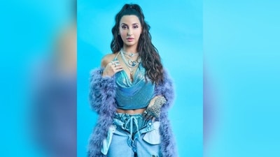 Assisted by celebrity makeup artist Reshmaa Merchant, Nora got decked up in pink shimmer eyeshadow, mascara-laden lashes, winged eyeliner, contoured cheeks and a shade of pink lipstick. (Instagram/@norafatehi) Assisted by celebrity makeup artist Reshmaa Merchant, Nora got decked up in pink shimmer eyeshadow, mascara-laden lashes, winged eyeliner, contoured cheeks and a shade of pink lipstick. (Instagram/@norafatehi)