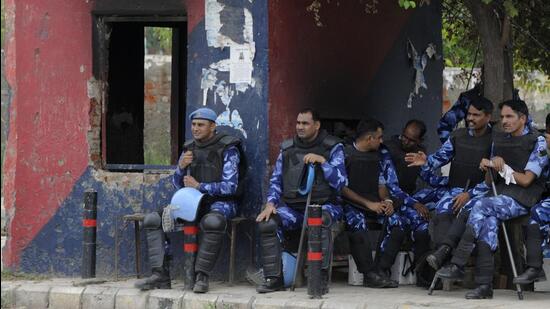 Rapid Action Force at Nuh chowk on Wednesday. (Parvee Kumar/ HT Photo)
