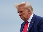 Former President Donald Trump arrives at Ronald Reagan Washington National Airport, Thursday, in Arlington, Va., as he heads to Washington to face a judge on federal conspiracy charges alleging Trump conspired to subvert the 2020 election.