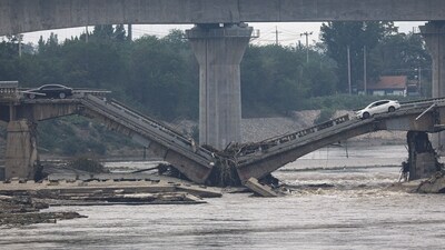 A bridge is damaged after remnants of Typhoon Doksuri brought rains and floods in Beijing, China. (REUTERS)