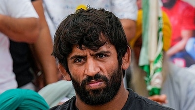 Wrestler Bajrang Punia speaks with the media during the protest against Wrestling Federation of India (WFI) chief Brij Bhushan Sharan Singh (PTI) Wrestler Bajrang Punia speaks with the media during the protest against Wrestling Federation of India (WFI) chief Brij Bhushan Sharan Singh (PTI)
