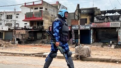 Riot police patrolling a street in Nuh. (AFP) (HT_PRINT)