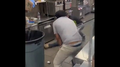 Screenshot of the store owner beating the thief with a stick. (IAN MILES CHEONG/Twitter) Screenshot of the store owner beating the thief with a stick. (IAN MILES CHEONG/Twitter)
